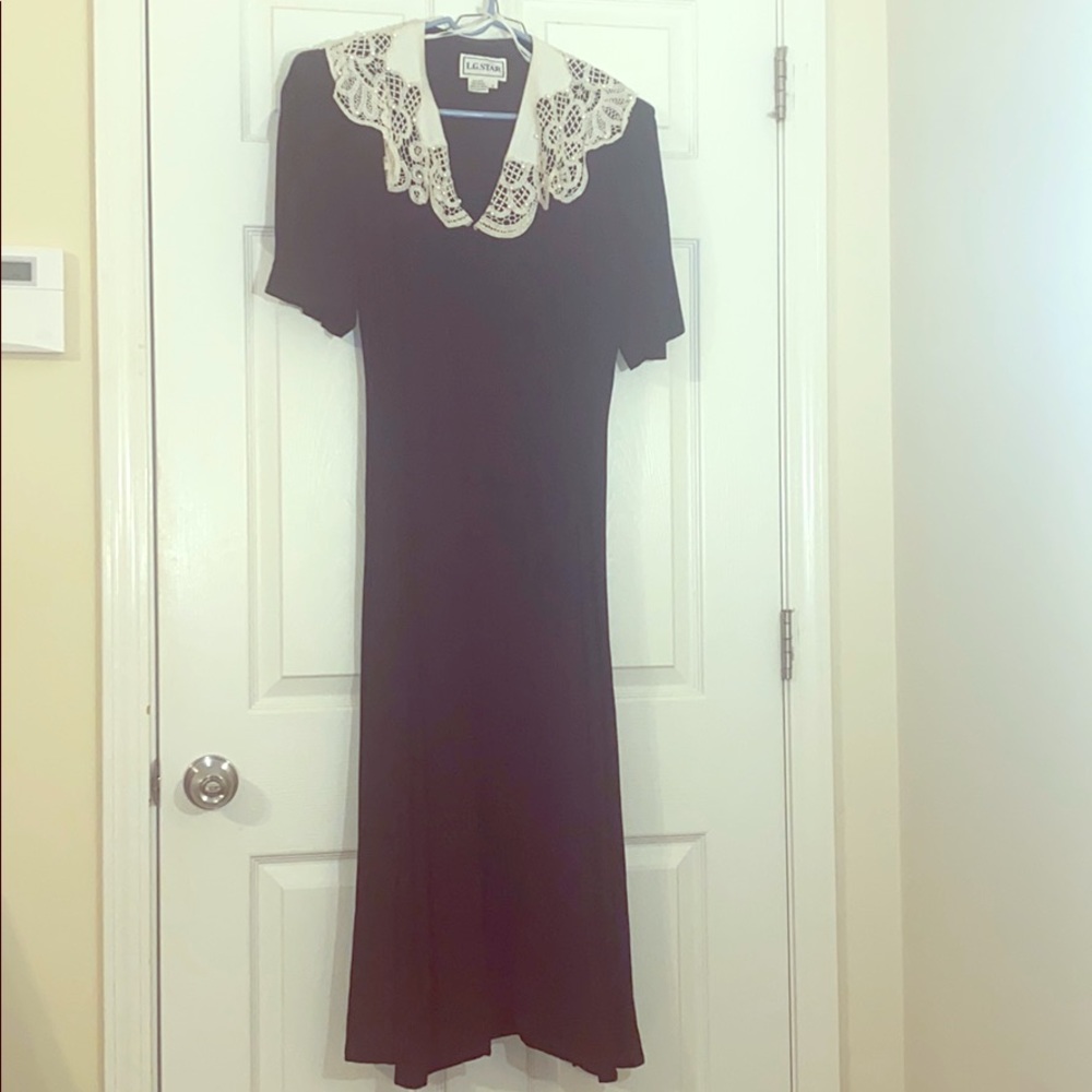 Vintage black dress with lace and pearl collar.